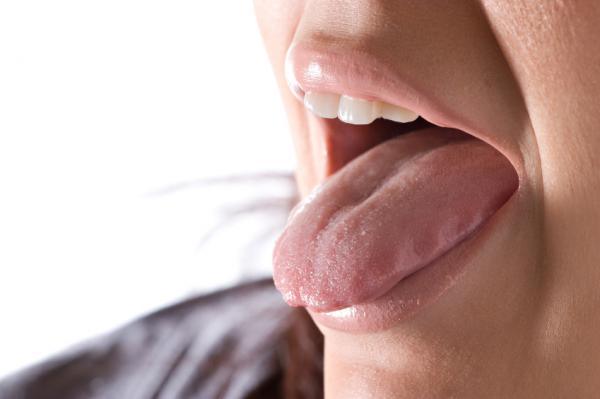 Was sind die Ursachen für weiße Zunge?