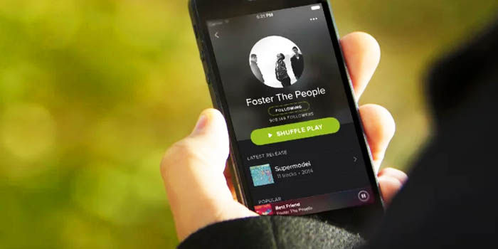 escuchar musica guardada movil spotify